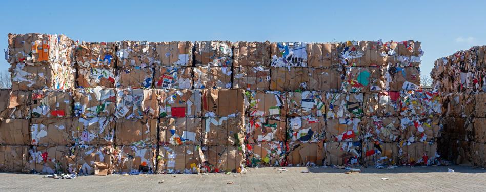 Piles of bundled, compressed recyclables.